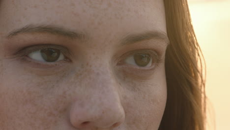 close up portrait beautiful red head woman opening eyes meditating at sunset praying exploring spiritual lifestyle enjoying mindfulness