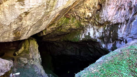 Explorers going down into the Zeus Cave in Psychro, Crete