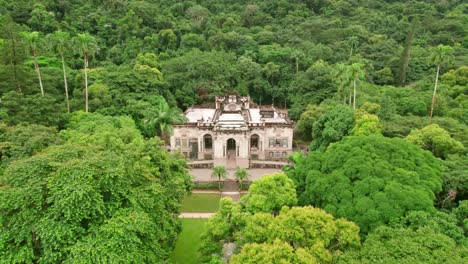 fly over lage park and the main palace hidden in the vegetation rio de janeiro, brazil