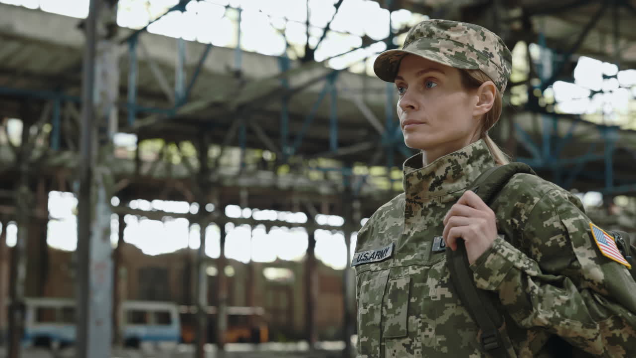 Woman Soldier in a Damaged Factory