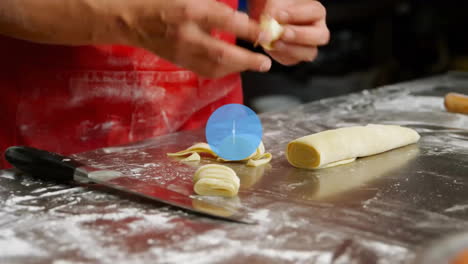 animation of network of connections over caucasian male chef making pasta