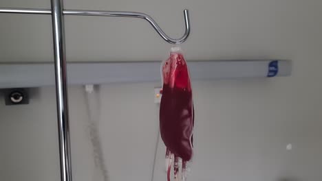blood bag hanging on iv pole