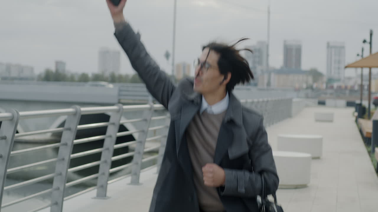 Happy Man Celebrating Outdoors