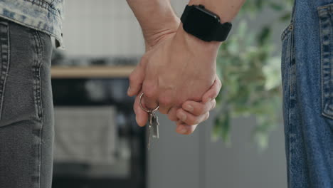 couple holding keys, new home
