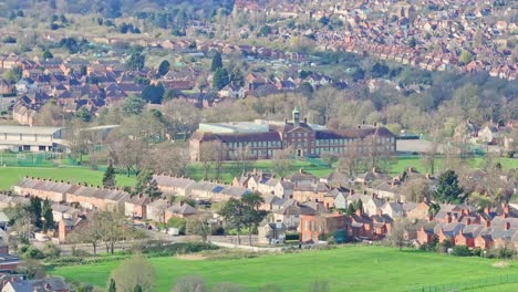 A-cinematic-aerial-shot-over-the-rooftops-of-Leicester,-UK