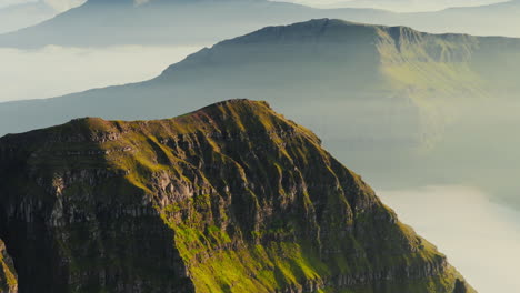 Majestic Mountain Peaks Emerging from a Sea of Clouds