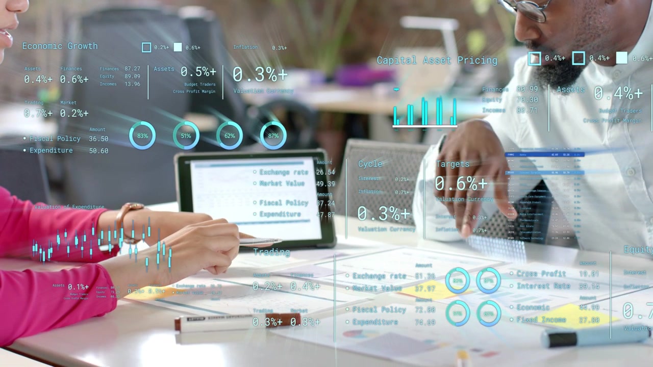 Woman tapping tablet starting financial overlay updating metrics and charts as coworkers agreeing