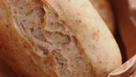 close-up of freshly baked bread rolls in a basket