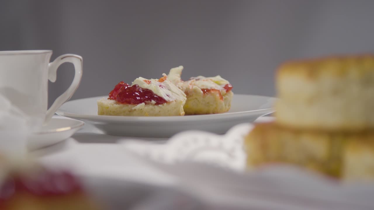 Close Up Of Traditional British Afternoon Tea With Scones Cream And Jam 3