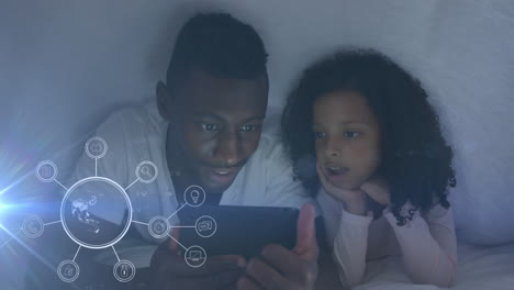 animation of smiling african american father and daughter using tablet, over globe spinning