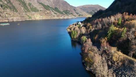 Hana-in-Sorfjorden-Norway-with-Osteroy-island-on-other-side,-Vaksdal-Aerial