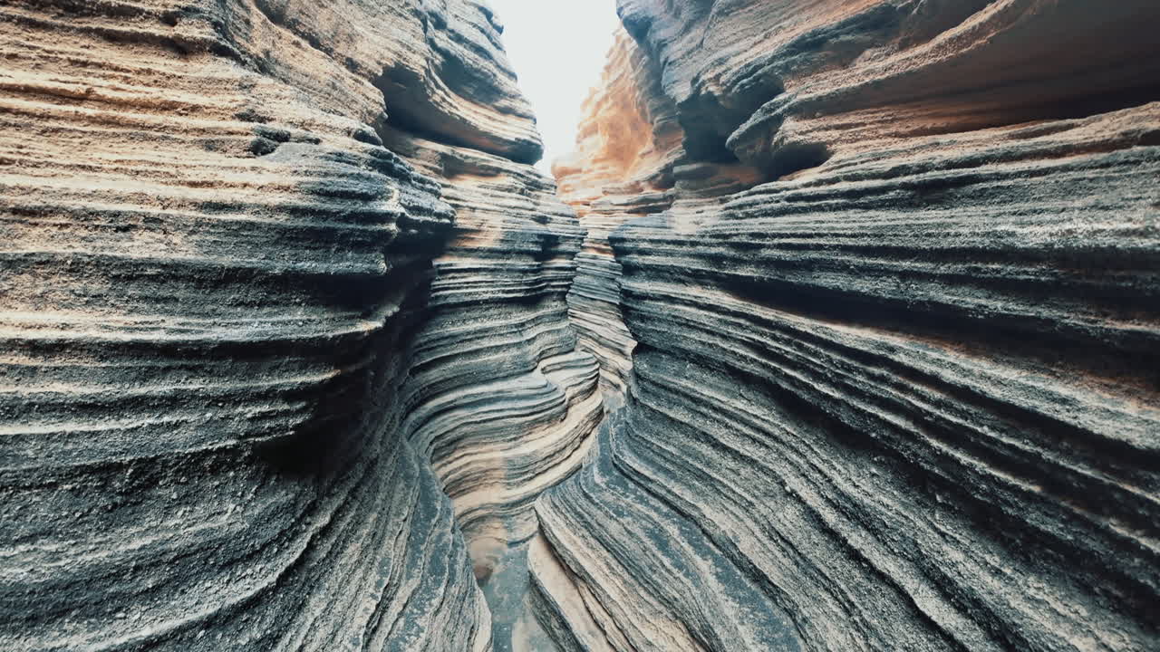 Las Grietas in Lanzarote: Surreal journey moving through a winding canyon with beautiful layered and eroded rock formations