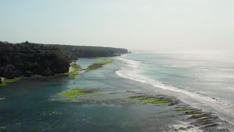 The-town-of-Bingin-at-the-cliffs-of-Uluwatu-during-low-tide