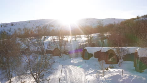 aerial drone view of snow hotel cabins in kirkenes, norway