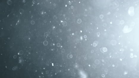 bokeh de partículas abstractas flotantes sobre fondo oscuro