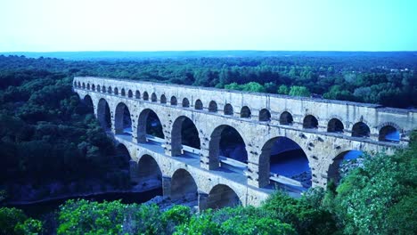 drone shot through nature on pont du gard stone bridge of the romans