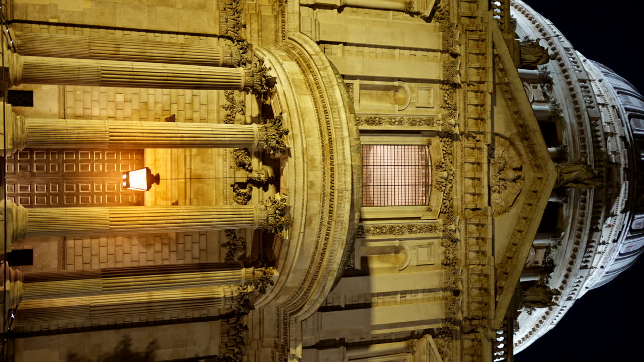 Vertical view of Saint Paul Cathedral facade in London downtown at night, United Kingdom