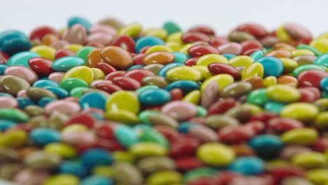 colorful coated chocolate candies rotating