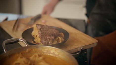 cooking steak with pasta