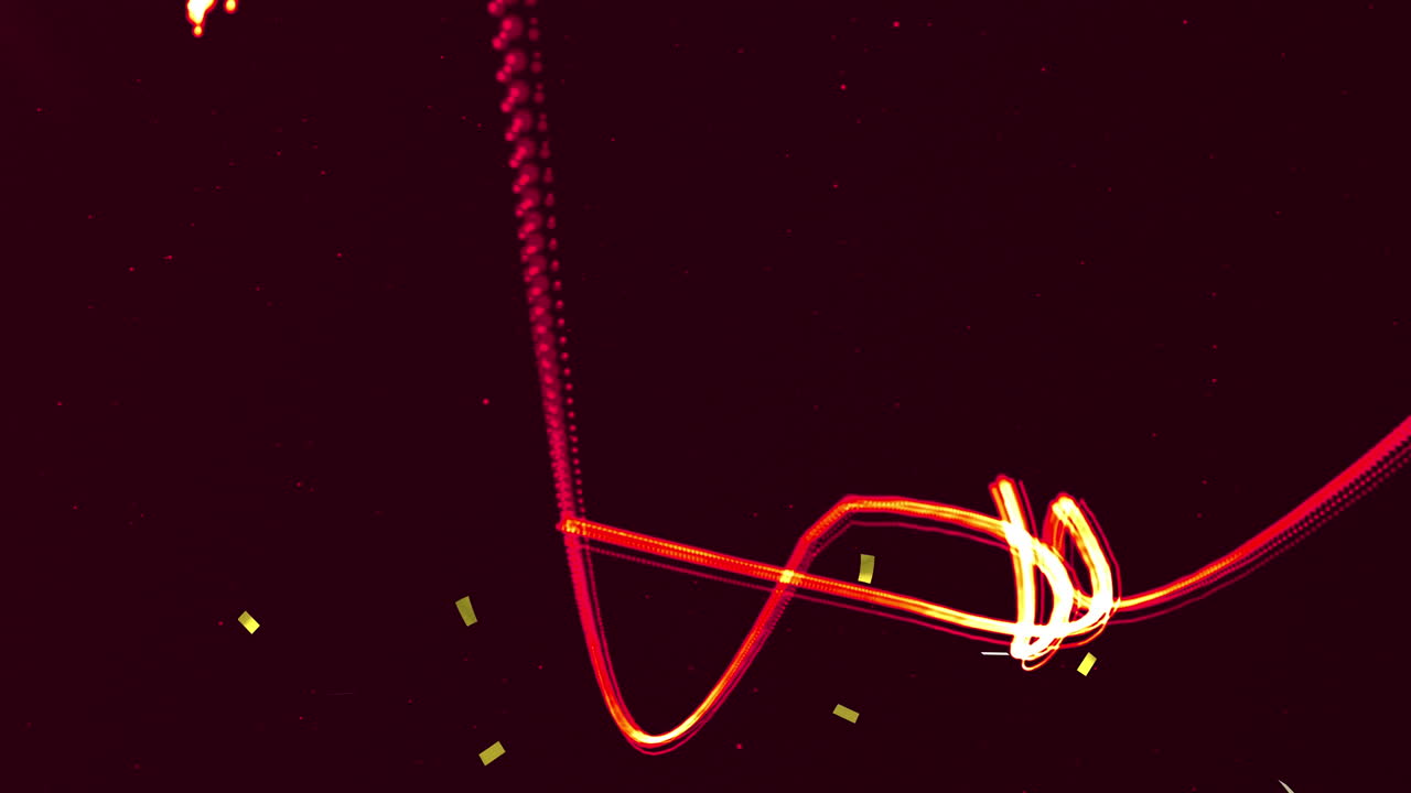 오렌지색 네온 빛의 흔적과 함께 떨어지는 금색 콘페티의 애니메이션