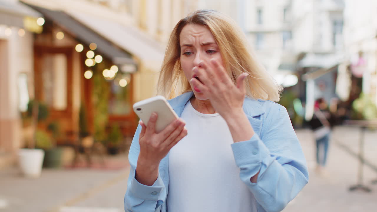 Sad woman using smartphone browsing loses lottery casino application results bad news fail virus