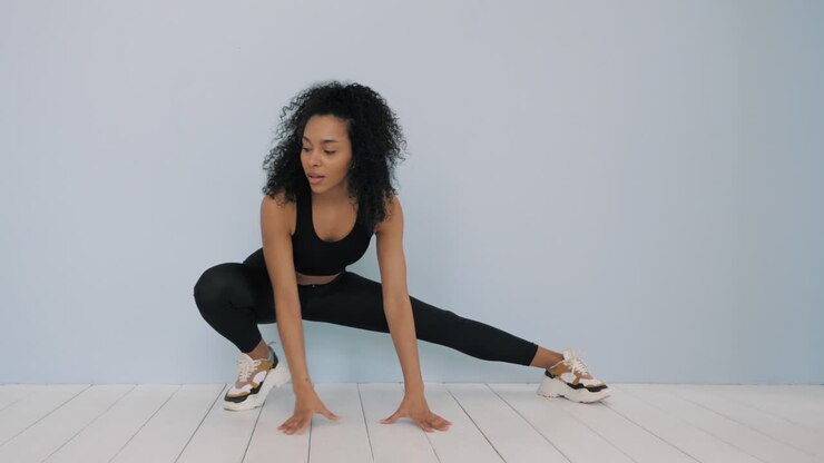 Woman Stretching and Exercising