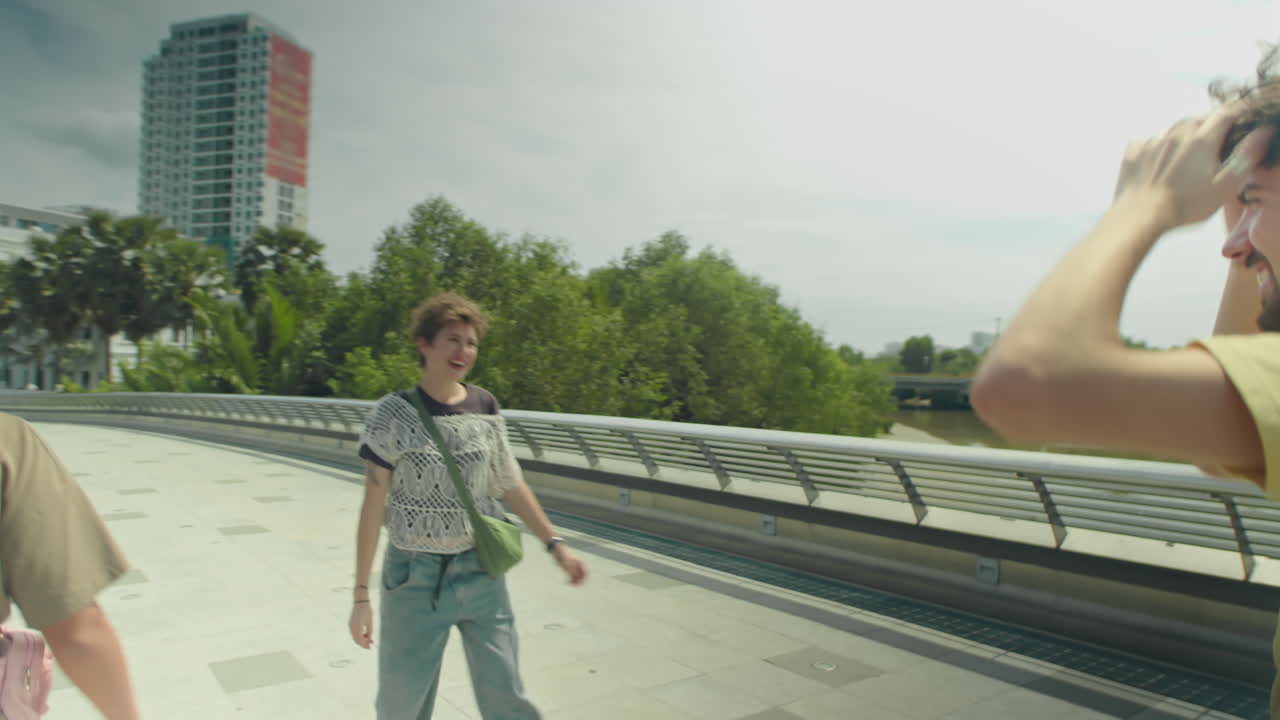 Friends Enjoying Walk in City on Summer Day