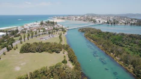 An-aerial-drone-shot-overlooking-the-beautiful-scenery-of-The-Entrance-North,-NSW,-Autralia