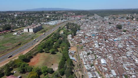aerial view over kibera rusted metal rooftops, largest slum in africa