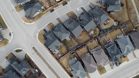 aerial view of a modern suburban community in calgary, canada, in spring after the snow melt