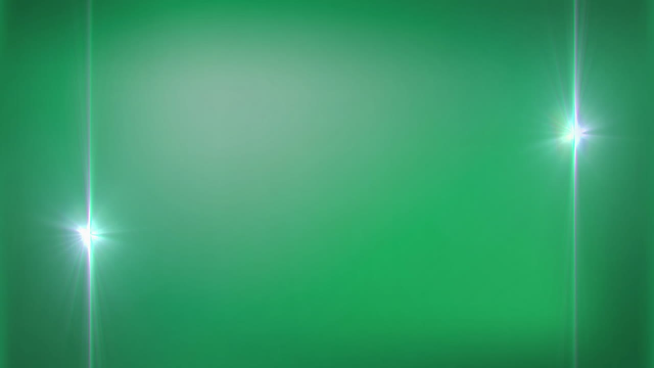 animación del destello de la lente moviéndose alrededor del fondo verde.