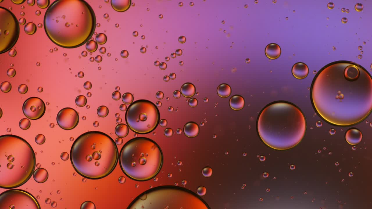 Colorful artistic of oil drop floating on the water.