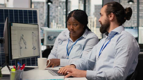 rd office coworkers use cad program to upgrade sustainable solar panel assembly