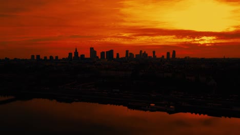 beautiful panoramic aerial drone skyline sunset view of the warsaw city centre with skyscrapers of the warsaw city and warsaw's old town with a market square and a mermaid statue, poland, eu