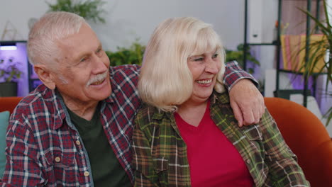 happy calm senior old grandparents pensioners smiling looking away dreaming resting feel satisfied