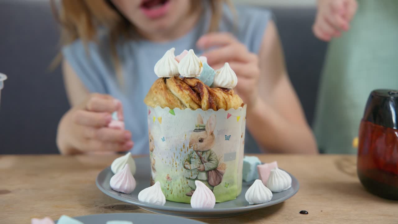 Children Decorating a Traditional Easter Cake with Meringues
