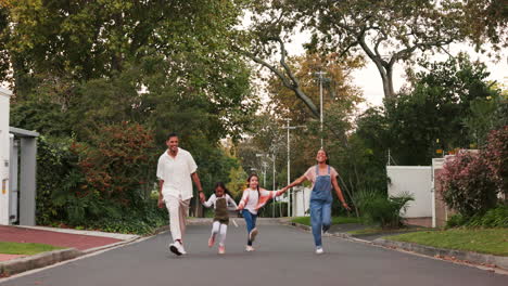 family, parents and kids in street