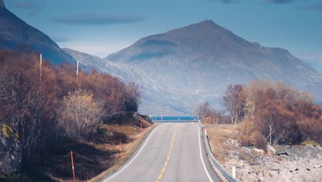 A-narrow-rural-road-follows-the-fjord-coastline