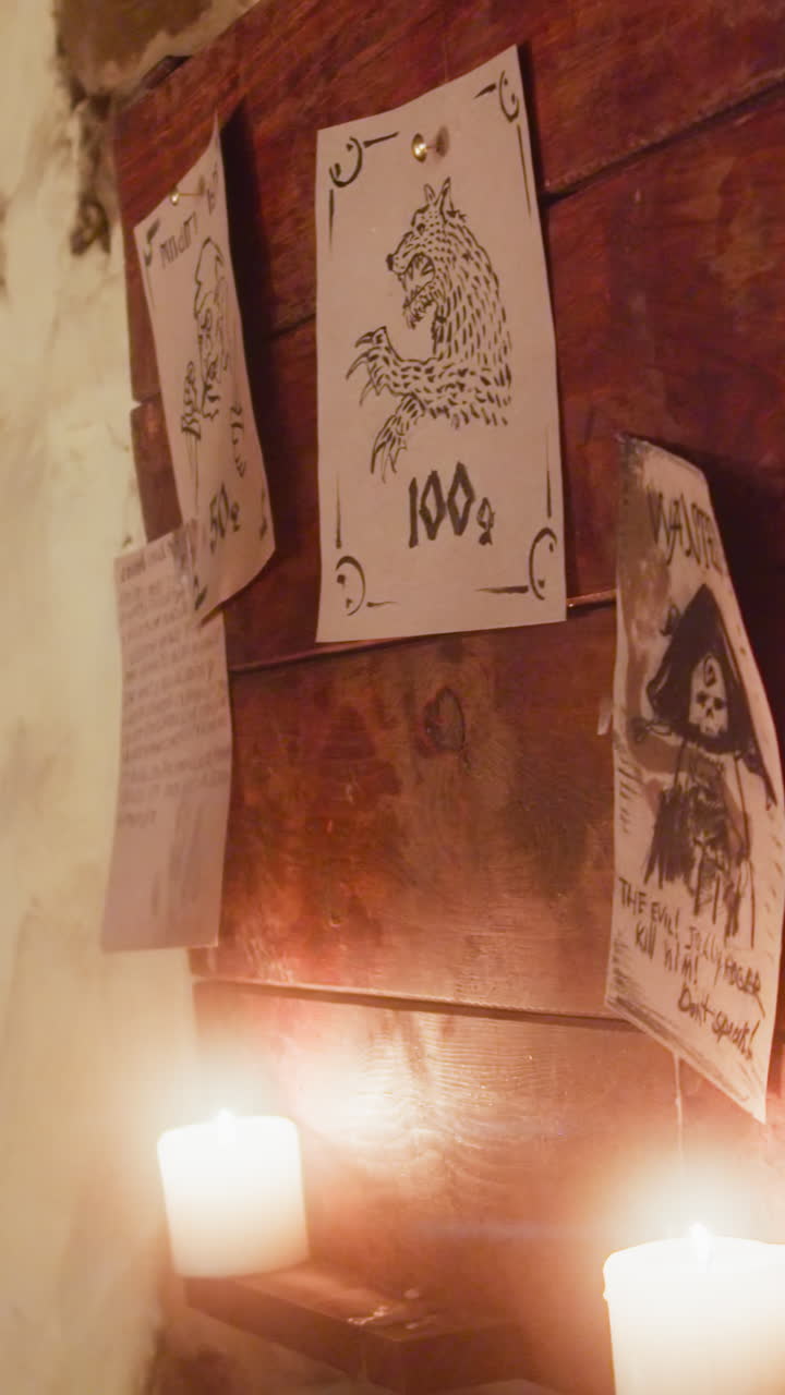 la camarera hace los platos y los viajeros leen el tablón de anuncios en la taberna. hombres valientes buscan trabajo con bestias de fantasía mientras que la joven trabaja en la casa de huéspedes