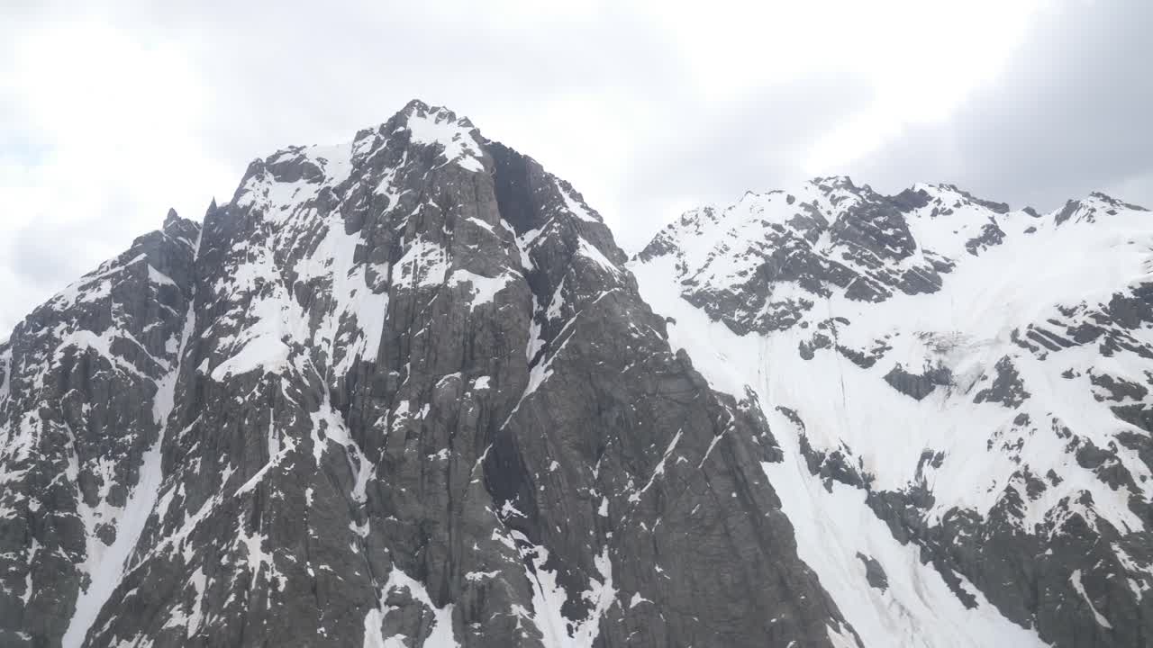 drone shot showing the snow mountain in full