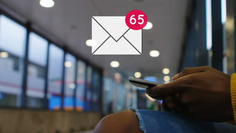 Person sitting at a terminal checking messages 4k