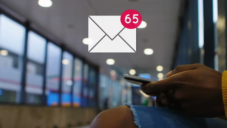 person sitting at a terminal checking messages 4k