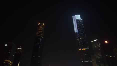 night time guangzhou city downtown famous megatalls buildings panorama 4k china