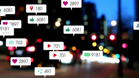 animation von social-media-icons, die gegen den verschwommenen blick auf den nachtverkehr in der stadt schweben