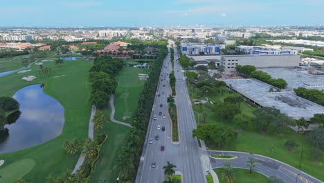 a scenic road in the city of doral in miami-dade county, florida, united states. aerial drone shot