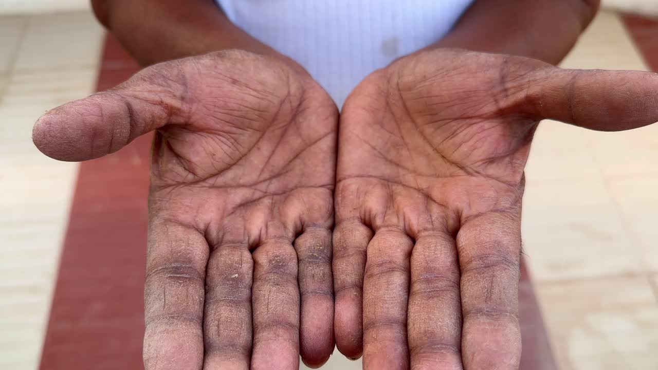 closeup of hand of hard working man