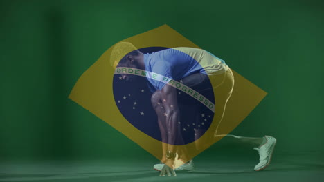 animation of flag of brazil over african american male athlete