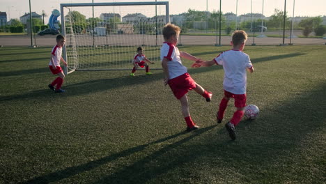young soccer players practicing on a field