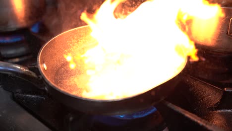 cooking shrimp in a cooking pan in slow motion