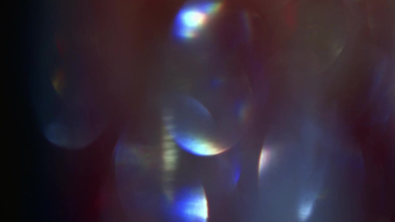 Dynamic Abstract Light Leaks Background with Rainbow Lens Flares
